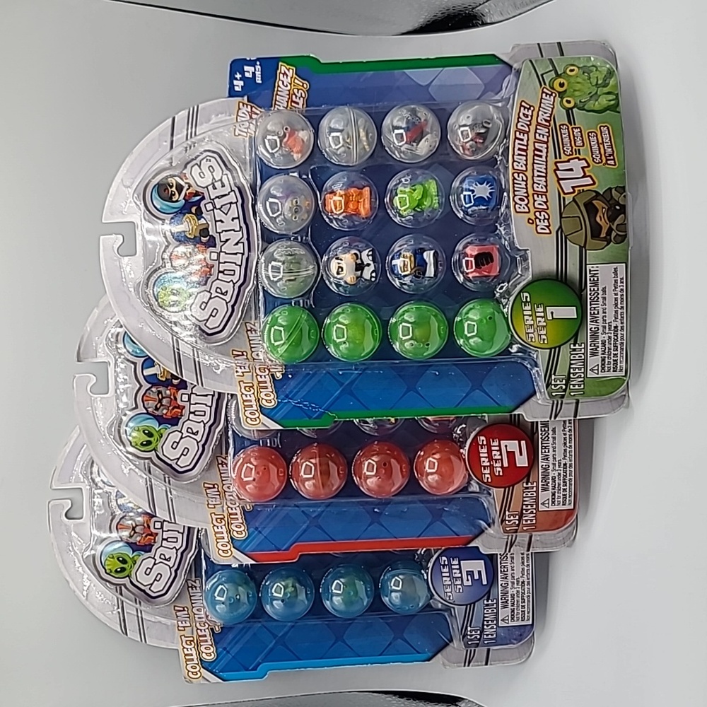 2011 Squinkies 3 Series 14 in each package, all 3 have bonus battle dice